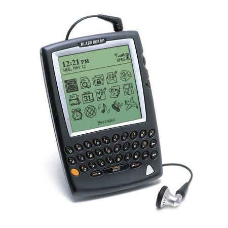 Image of a BlackBerry 5810 with the application screen options including calendars, email, and phone calls. 