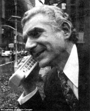 Martin Cooper makes a historic call on on 6th Avenue in New York City, April 3, 1973.